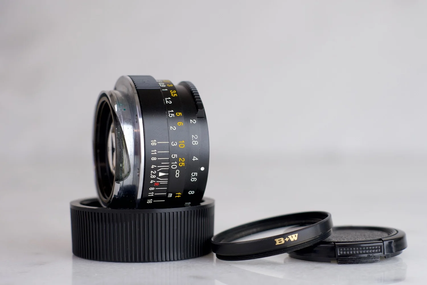 Minolta M Rokkor 40mm F/2 Lens with B+W UV Filter, Front and Rear
